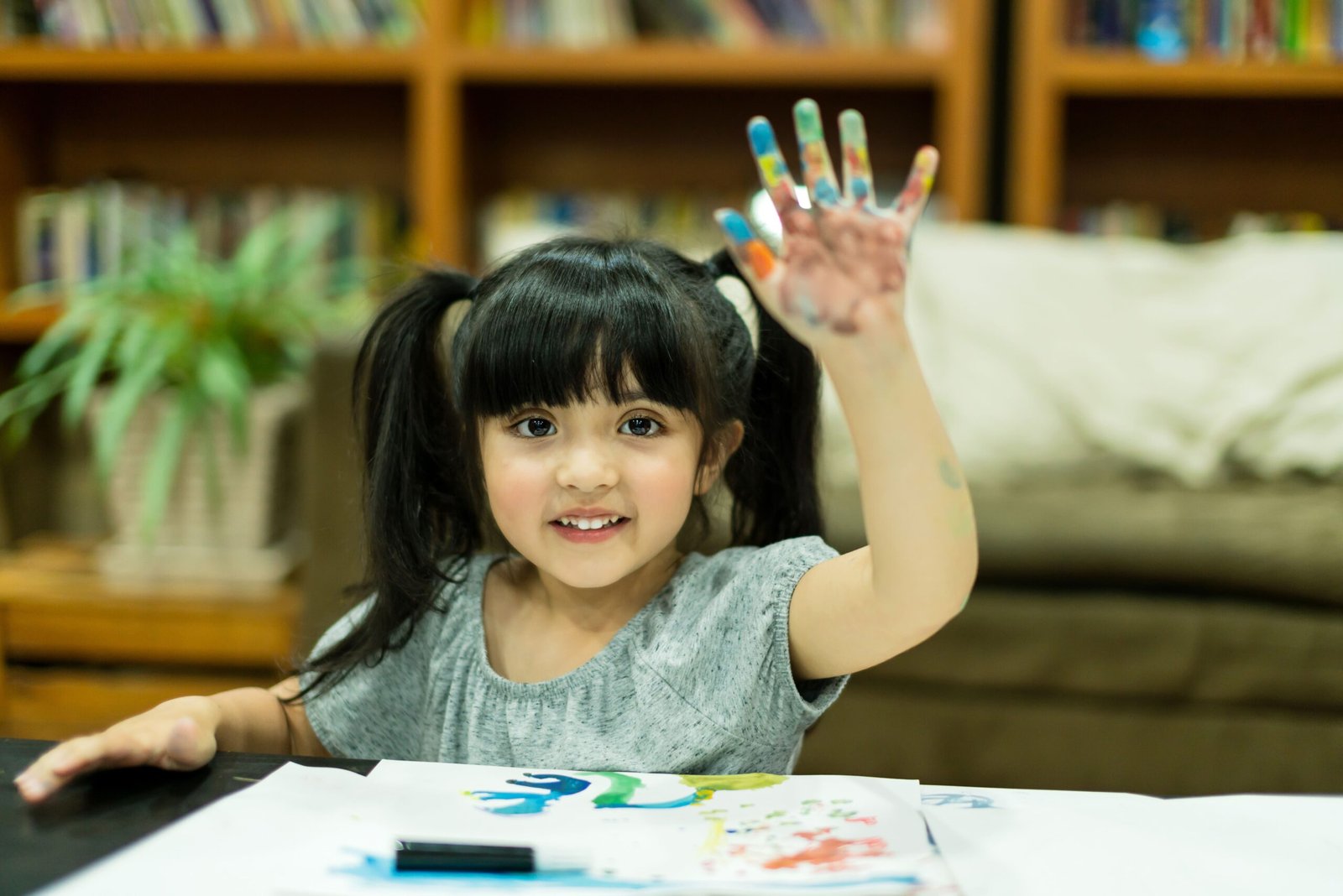 cheerful girl kid enjoy color painting with creativity ideas present messy hand home scaled